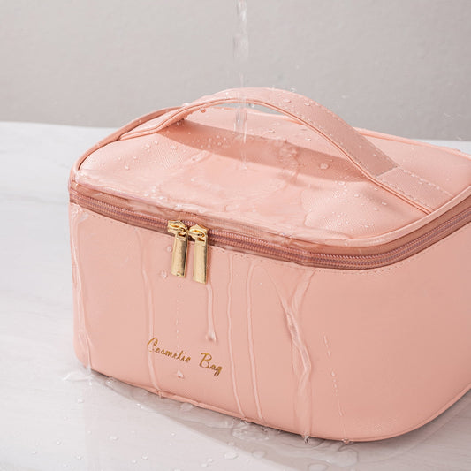 Travel makeup bag fully open — spacious main compartment and exterior brush pocket