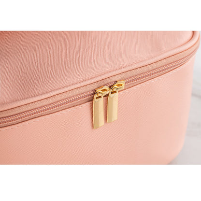 Gold zipper and handle on Miraveila travel bag — quality hardware close-up