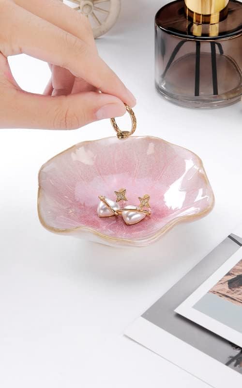 Lotus leaf shape detail close-up — sculpted ceramic with pink glaze texture