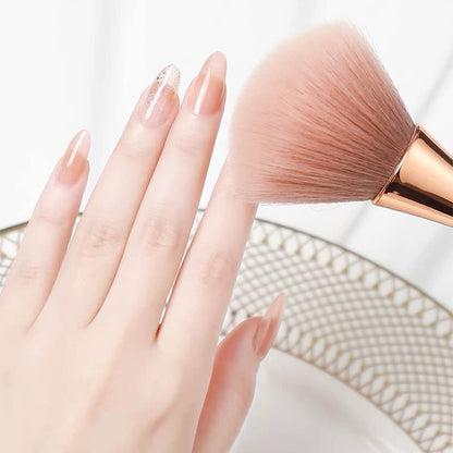 All 3 fluffy brushes laid flat — fan brush powder brush and blush brush set