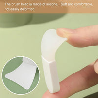 Silicone applicator bristles close-up — soft flexible tips for gentle mask spreading