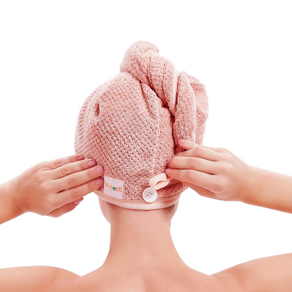 Button closure on Miraveila hair towel — secure fastening mechanism close-up