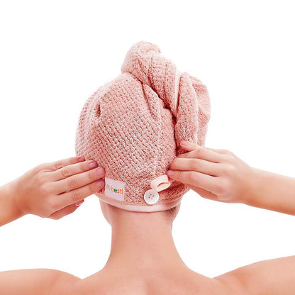 Button closure on Miraveila hair towel — secure fastening mechanism close-up