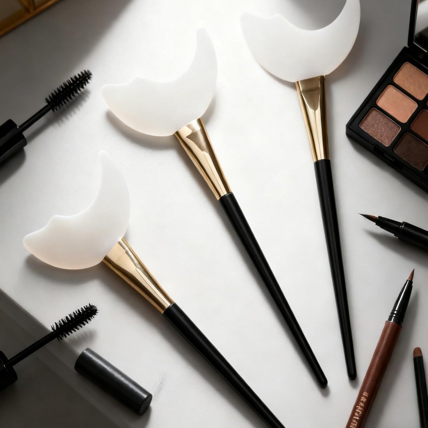 Multiple Miraveila lash shields spread out — reusable mascara guard set