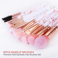 Pink marble brushes fanned out — all 16 professional brushes displayed together