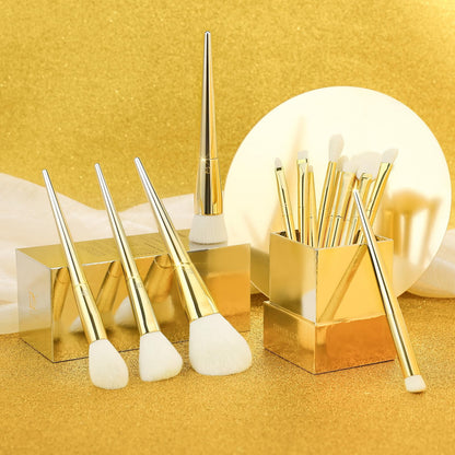 Powder and contour brushes from gold set — ultra-soft bristle tips close-up