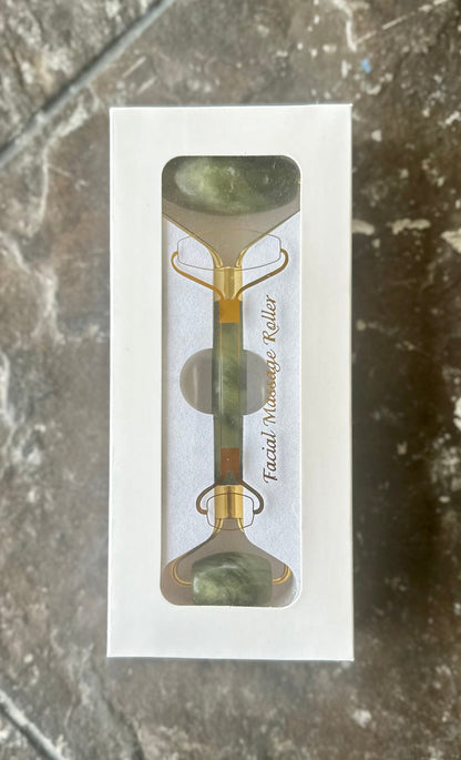 Jade Roller used on cheek — lymphatic drainage and de-puffing massage motion