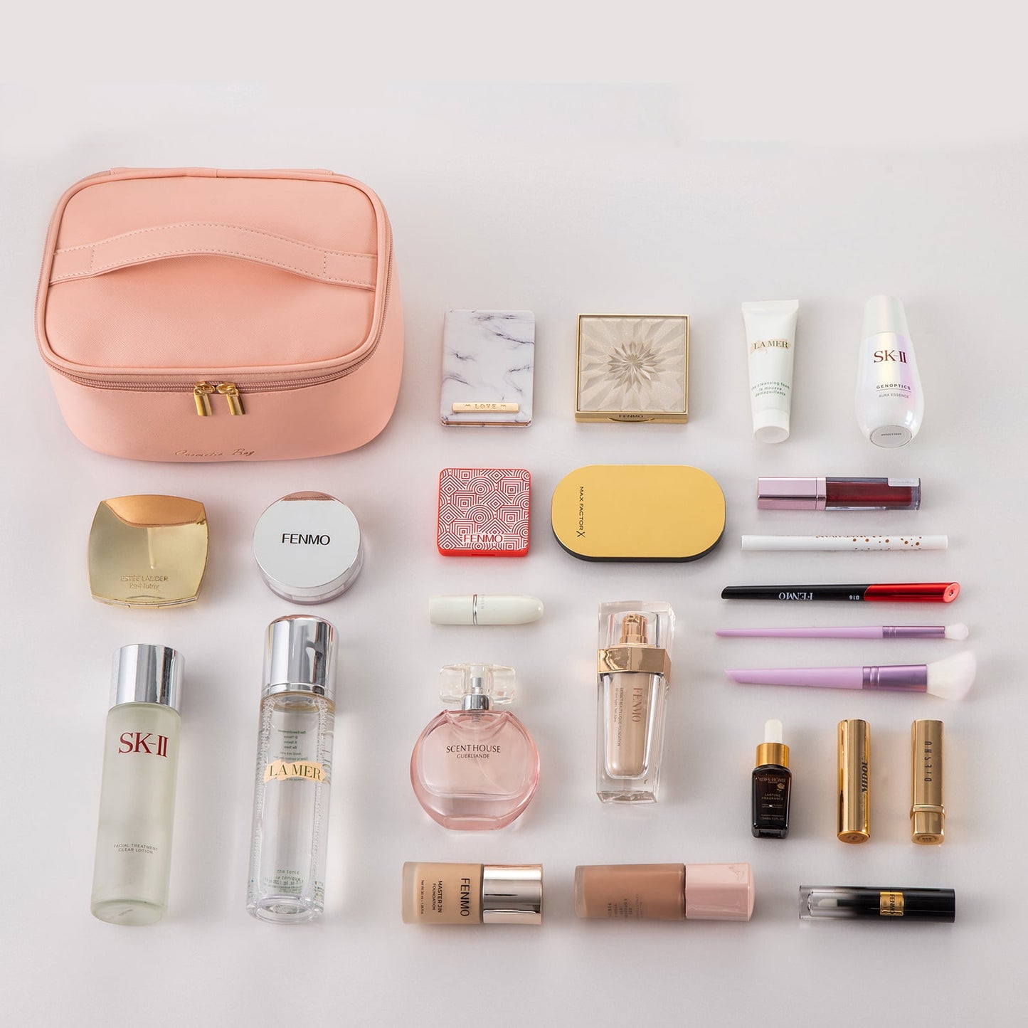 Cosmetic bag packed with makeup and brushes — fully loaded travel beauty organizer